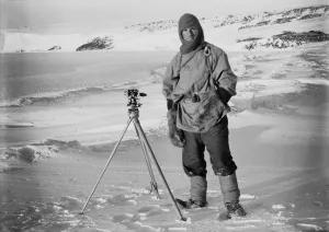 British Antarctic Expedition 1910-13 (Terra Nova) Gallery: Lt Edward Evans and one of the sledging theodolites, (Barne Glacier in the background). October 1911