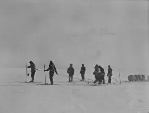 Sledging, eight men man-hauling a sledge