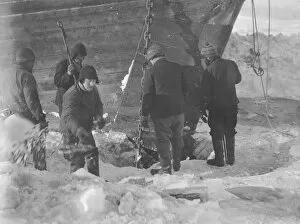Snow Collection: Trying to cut the anchor free from the ice
