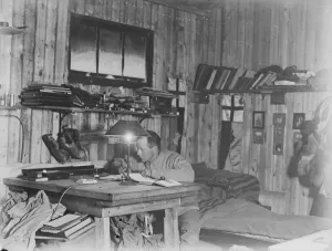 George Murray Levick Gallery: Victor Campbell working at his desk
